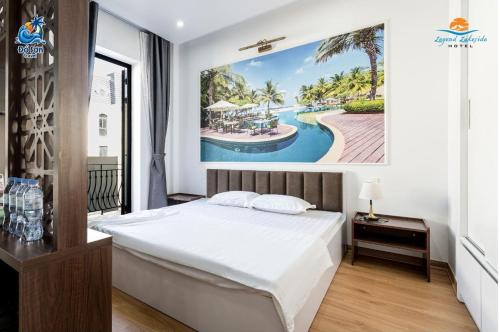 Ένα ή περισσότερα κρεβάτια σε δωμάτιο στο Legend Lakeside Hotel