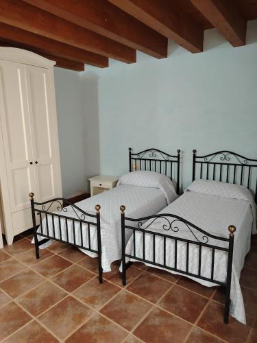 Postel nebo postele na pokoji v ubytování Albergo diffuso Sa Costa Ittireddu