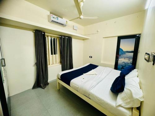 Ένα ή περισσότερα κρεβάτια σε δωμάτιο στο Alivious Beach Homestay