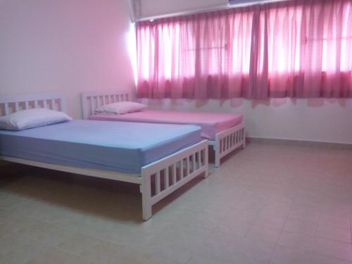 Postel nebo postele na pokoji v ubytování Asia Don Mueang Bangkok Condominium