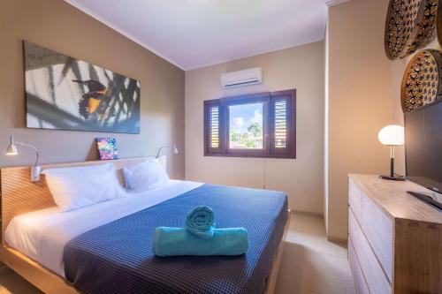 Postel nebo postele na pokoji v ubytování Spanish Water Apartments - La Maya Resort at Jan Thiel