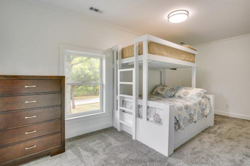 a bedroom with a white bunk bed and a window at Walk to Winery Family-Friendly Holt Getaway in Kearney