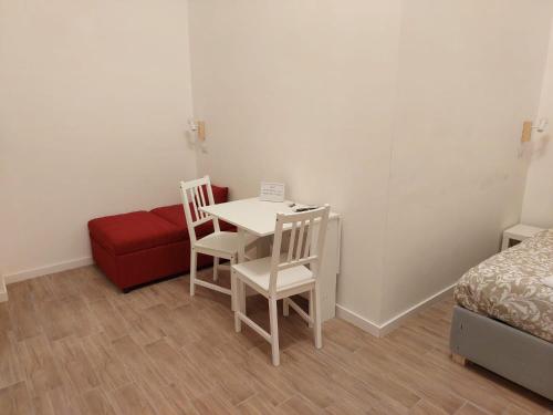 Ένα ή περισσότερα κρεβάτια σε δωμάτιο στο Residence e appartamenti Bausan