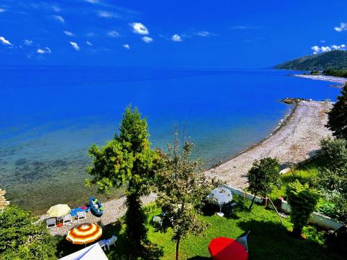 a view of a beach with a large body of water at Seafront Apartment Rize-Ardeşen in Ardeşen