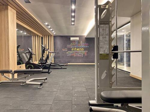 a gym with several treadmills and exercise bikes at Boutique 16 - Alanya Experience in Alanya