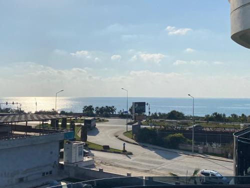 a view of a road with the ocean in the background at Boutique 16 - Alanya Experience in Alanya