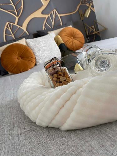 a blanket on a bed with some nuts on it at Vida Verde in Valkenburg