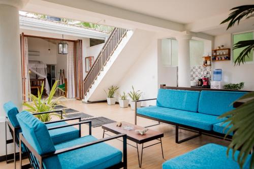 Un lugar para sentarse en Mawbima Villa