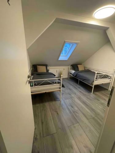 Postel nebo postele na pokoji v ubytování 10 Personen Appartment Bad Rappenau