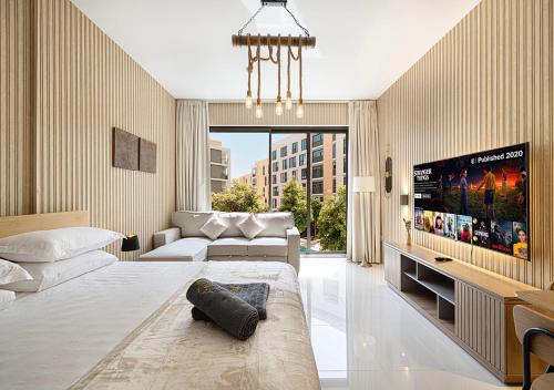 Ένα ή περισσότερα κρεβάτια σε δωμάτιο στο The Prestige Studio by Blue Cloud Holidays