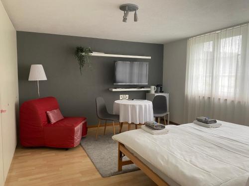 Postel nebo postele na pokoji v ubytování Flamboyant