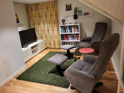 TV a/nebo společenská místnost v ubytování Sahlin - Kattarp