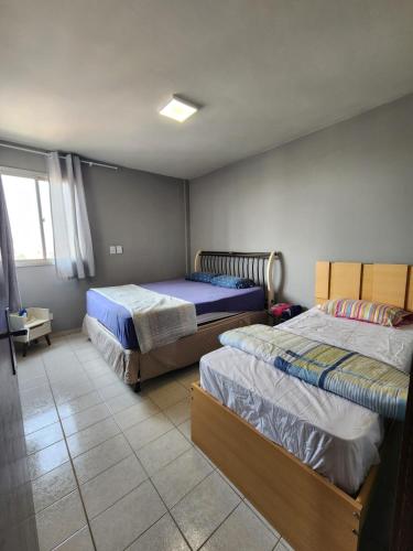 Postel nebo postele na pokoji v ubytování 1102 Apto Inteiro - Área Central