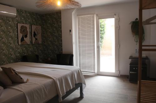 Postel nebo postele na pokoji v ubytování Casa la Siësta Albir