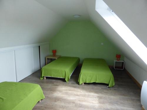 Cama ou camas em um quarto em Résidence Saint-Yves