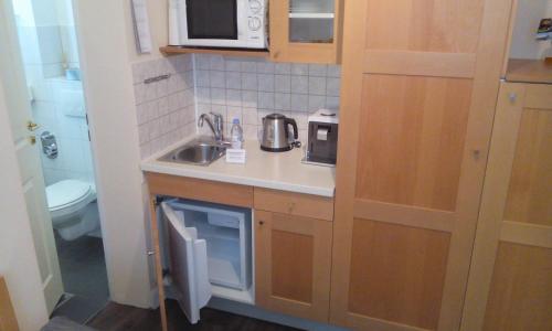 Kuchyň nebo kuchyňský kout v ubytování DARZ GästeZimmer