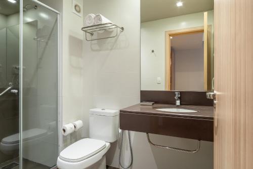 Ένα μπάνιο στο Hotel Laghetto Pedras Altas