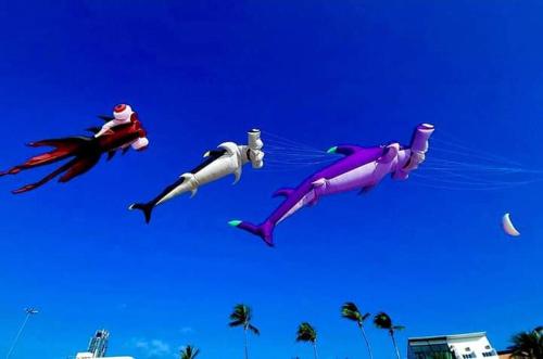 three octopus kites flying in the blue sky at Studio Seaview Jomtien floor12 23sqm in Jomtien Beach