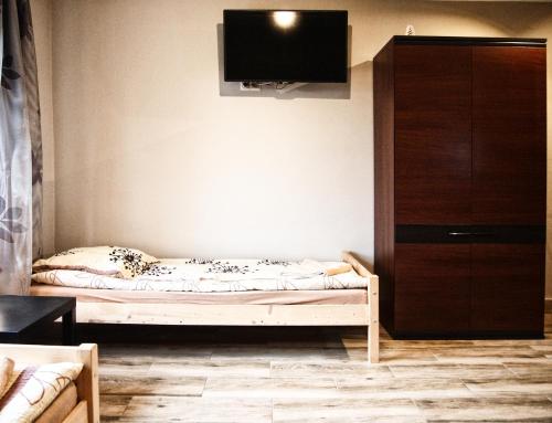 Tempat tidur dalam kamar di Villa 106
