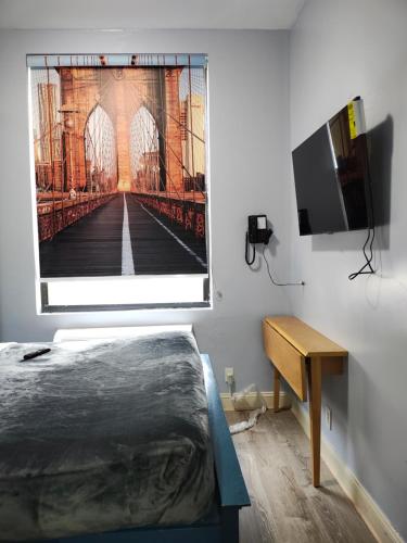 TV a/nebo společenská místnost v ubytování Essence hotel