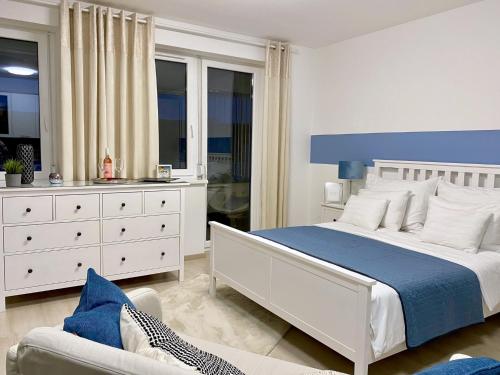 Postel nebo postele na pokoji v ubytování Leonardo50 Apartment