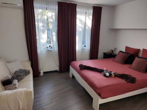 a bedroom with a bed with a camera on it at Vida Verde in Valkenburg