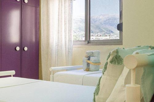 Ένα ή περισσότερα κρεβάτια σε δωμάτιο στο Stella's Stylish Studio - 1min beach w kitchen