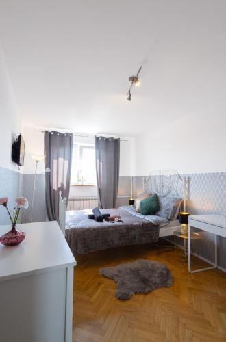 Postel nebo postele na pokoji v ubytování ClickTheFlat Wilson Square Apart Rooms
