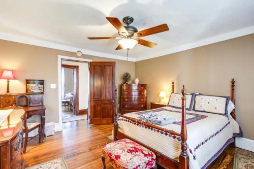 a bedroom with a bed and a ceiling fan at 6 Mi to Hickory Run Park Victorian Home with Porch in White Haven