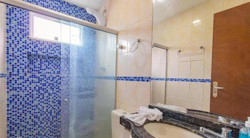 Ένα μπάνιο στο Casa espaçosa no Prive Baia do Cupe