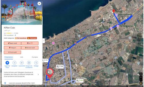 a map with a blue line on it and a blue trail at Hostel SA Bab Ezzouar in Le Lido