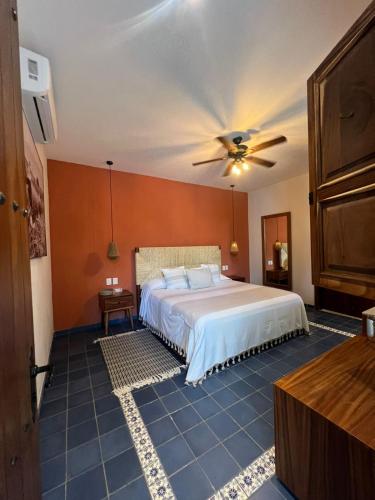 Postel nebo postele na pokoji v ubytování Hotel Boutique Gloriagave