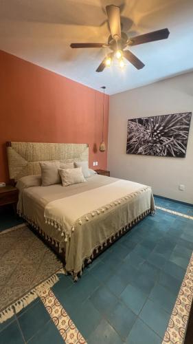 Postel nebo postele na pokoji v ubytování Hotel Boutique Gloriagave