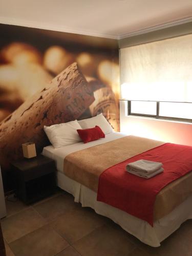 Una cama o camas en una habitación de Edificio Terravina