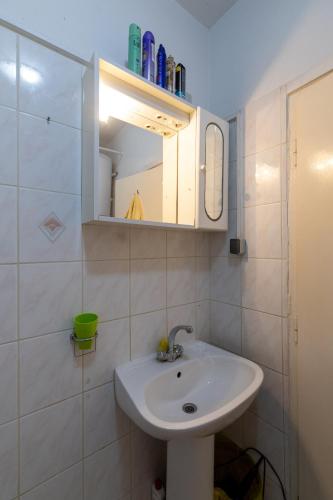 a bathroom with a sink and a mirror at Apartment Zarace - Gdinj 2047b in Gdinj