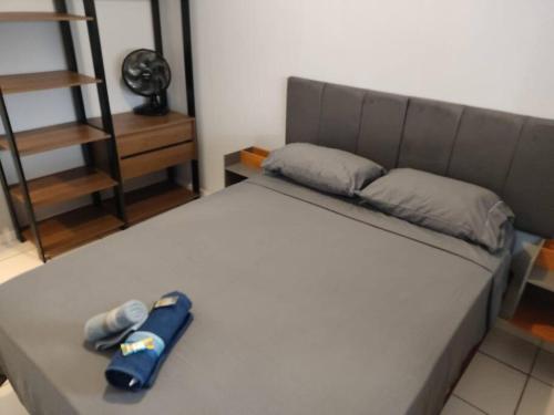Postel nebo postele na pokoji v ubytování Aconchegante Ap em Sete Lagoas