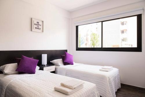 Giường trong phòng chung tại MG Baires - Dos ambientes 1C en Alquiler Temporario en Buenos Aires