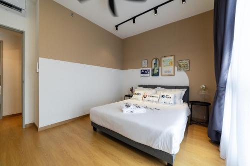 MayaBay Residence SplashMania Gamuda Cove Homestay by Sleepy Bearにあるベッド