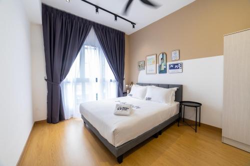 MayaBay Residence SplashMania Gamuda Cove Homestay by Sleepy Bearにあるベッド