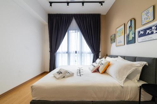 MayaBay Residence SplashMania Gamuda Cove Homestay by Sleepy Bearにあるベッド