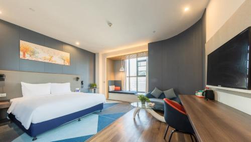 Μια τηλεόραση ή/και κέντρο ψυχαγωγίας στο Holiday Inn Express - Wuhan Optical Valley by IHG