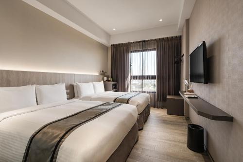 Postel nebo postele na pokoji v ubytování Hotel YAM LAGOM