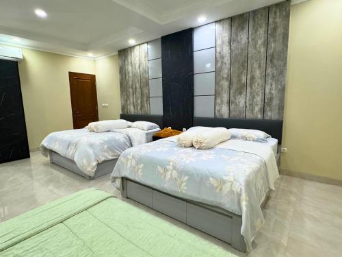 Cama o camas de una habitación en Omah Klekaran