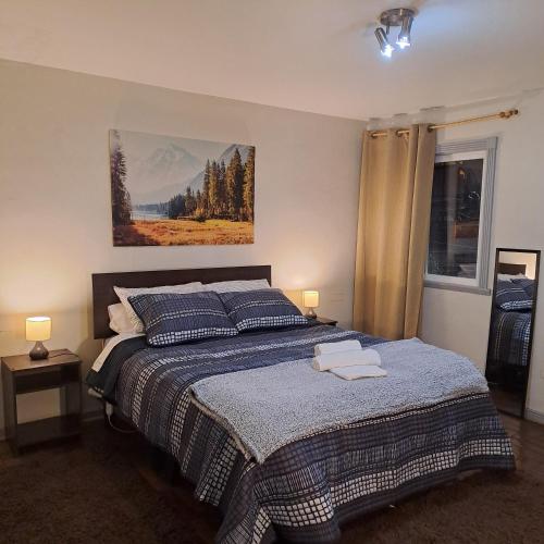 Ένα ή περισσότερα κρεβάτια σε δωμάτιο στο Departamento Central Osorno