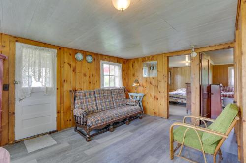 a living room with a couch and a chair at Honesdale Cabin 110 Shared Acres, Animal Rescue! in Honesdale