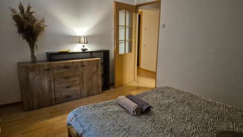 Postel nebo postele na pokoji v ubytování Alka Lake Inn