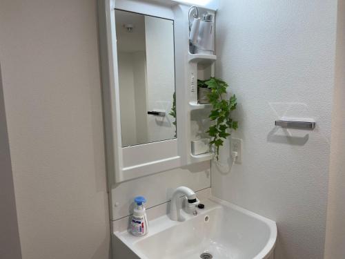 Bilik mandi di COMMA HOUSE Otsuka 202