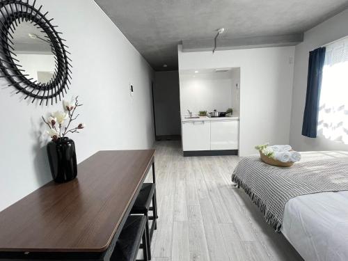 Katil atau katil-katil dalam bilik di COMMA HOUSE Otsuka 202
