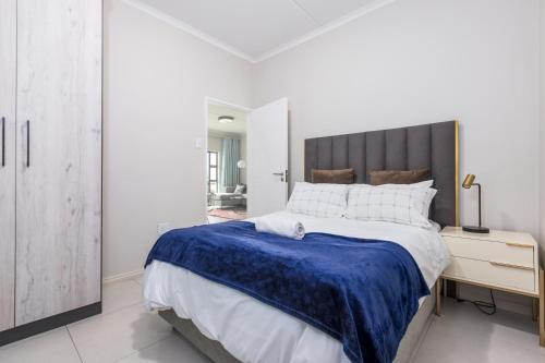 Katil atau katil-katil dalam bilik di Smartz Apartment