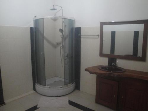 Ett badrum på Priyanka Villa